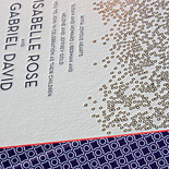 Isabelle and Gabriel: champagne bubble inspired, gold foil and navy letterpress with red edging 