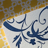 Michelle and Nivritt: one color letterpressed invitation with floral motif and patterned yellow liner