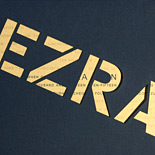 Ezra: Bar Mitzvah invite with laser cut pocket folder and gold metallic insert piece