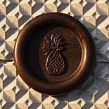 Jackie and Anthony: custom pineapple collection including silk box, embossed paper and custom wax seal