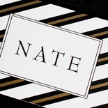 Nate: black and gold bell-press with custom belly band graphic Bar Mitzvah invitation