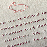 Bea: birth announcement letterpressed with bunny motif, rounded corners and pink liner