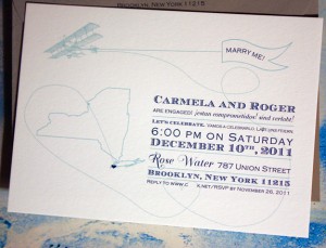 Carmela and Roger: Come Fly with Me, digitally printed in navy and turquoise with gravel envelope