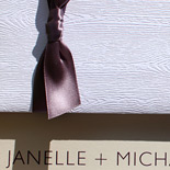 Janelle and Michael: white woodgrain pocketfold with earth cardstock and chocolate thermography 