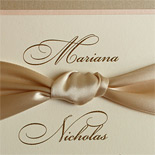 Mariana and Nicholas: traditiional wedding invitation suite with double backer, ribbon, thermography printed in gold with cream and champagne tones