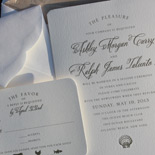 Ashley and Ralph: thermography printed in taupe with a romantic beach theme and sand inspired liner in a die cut envelope
