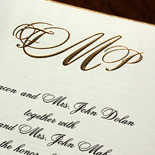 Francesca and Patrick: wedding invitation featuring a gold ink monogram