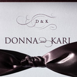  Donna and Karl: this romantic wedding invitation features ribbons, layers, embellishments and is thermography printed 
