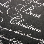 Brooke and Christian: a new take on the classic black and white wedding invitation with white foil on black stock