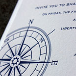 Kimberly and Aaron: nautical pocket folder wedding invitation suite featuring vintage map and compass