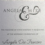 Angela and Mike: invitation with glitter ink, charcoal thermography on shimmer metallic paper and illustrated NYC skyline. Urban and sophisticated.