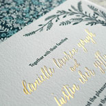 Danielle and Justin - A truly lovely combination of letterpress and gold foil with branches framing the pieces and a garden liner