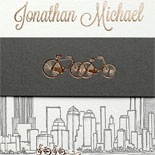 Stephanie and Jonathan - This Tour de Manhattan includes the NYC skyline, copper foil on all invitation pieces and belly band and bicycles scooting all about these NYC landmarks. Illustration by Victoria Neiman Illustration.