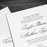 Taylor and Matthew - Classic black and white never goes out of style. Black thermography ink with a black painted edge and a black pattern on black envelope liner
